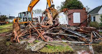 Deconstructing homes so building materials can be recyled and reused.