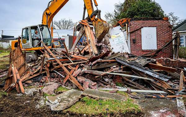 Deconstructing homes so building materials can be recyled and reused.