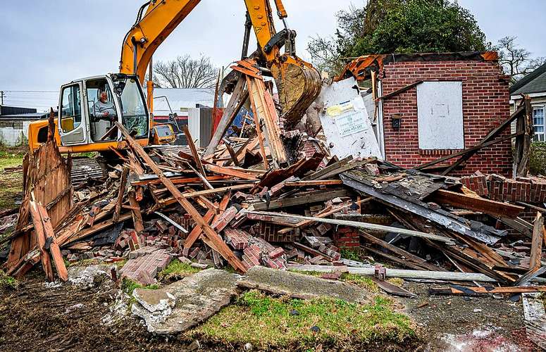 Deconstructing homes so building materials can be recyled and reused.